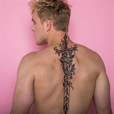 <strong>Paul</strong> had <strong>tattoos</strong> done on his arms, legs and feet Credit: Instagram. . Jake paul sword tattoo